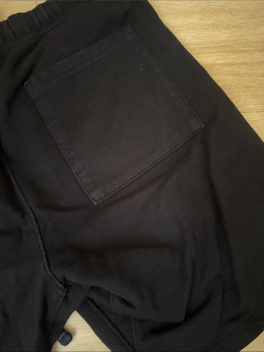 Black Athletic Shorts with Red 'S' Graphic